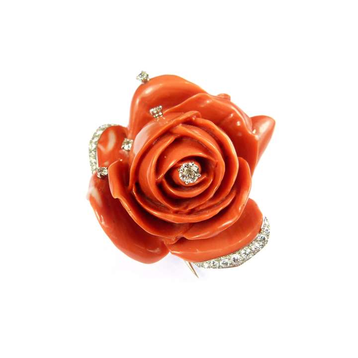 Mid-20th century carved corallium rubrum and diamond rose brooch naturalistically modelled